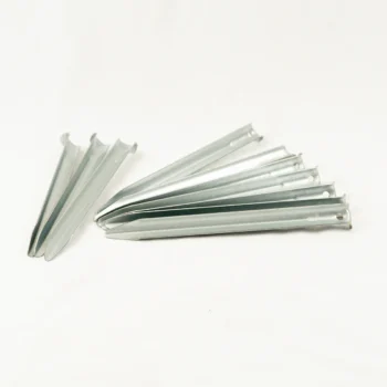 Set of small metal brackets with a single mounting hole, arranged on a white background.