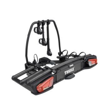 Thule two‑bike rear-mounted rack with adjustable arms, wheel trays, and integrated red taillights for carrying two bicycles